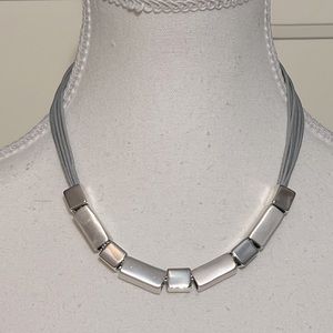 Silver necklace with square beads. NWT.